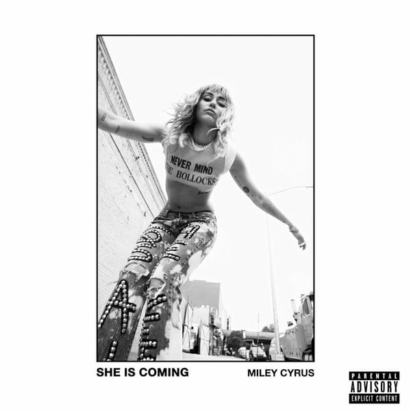 SHE IS COMING cover
