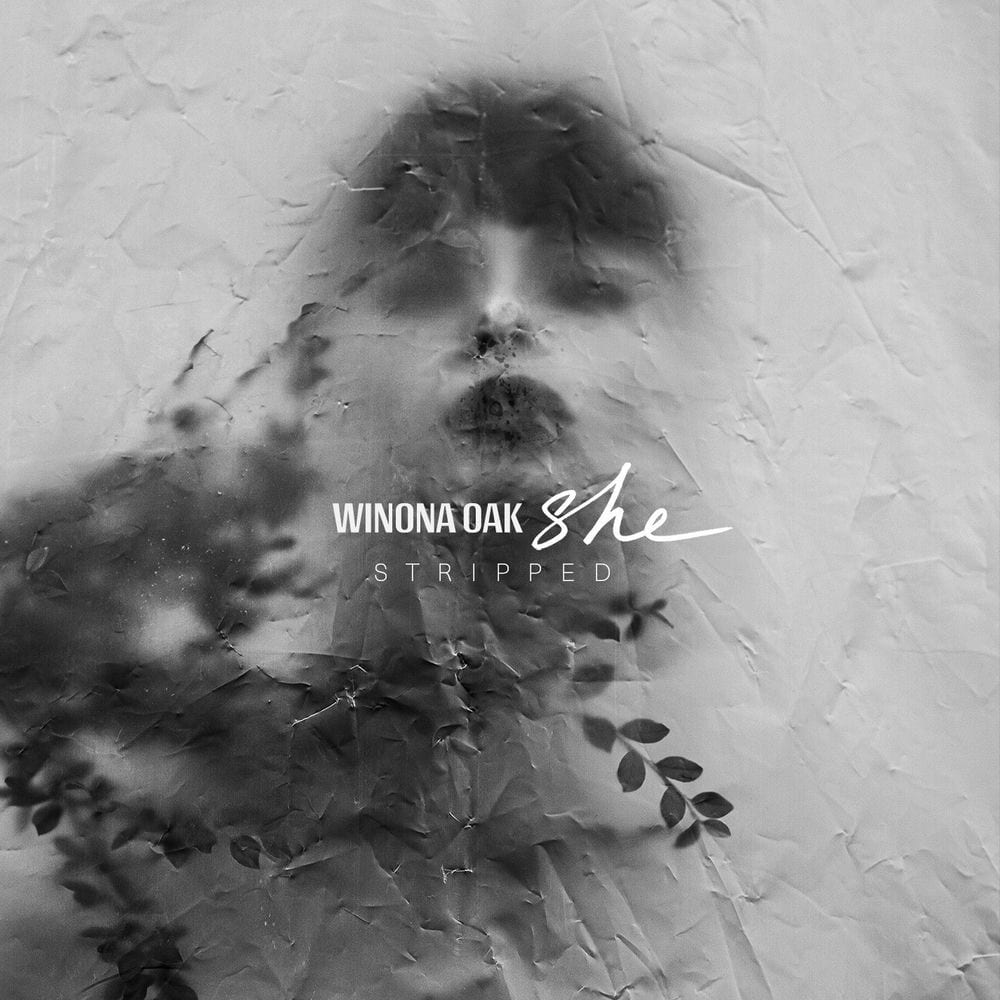 SHE (Stripped) cover