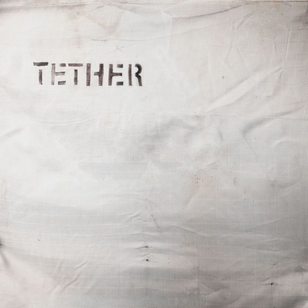 Tether cover