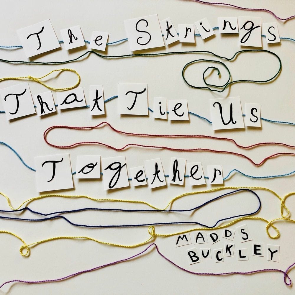 The Strings That Tie Us Together cover