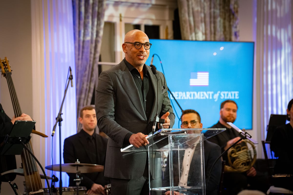 Harvey Mason Jr. speaking at a podium in 2023