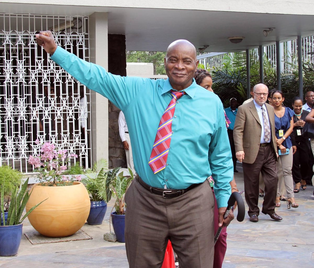 The Mighty Sparrow raising his fist at the US Embassy in Trinidad in 2015